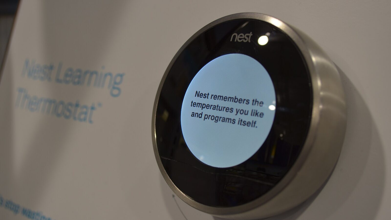 Nest Learning Thermostat mounted on a wall