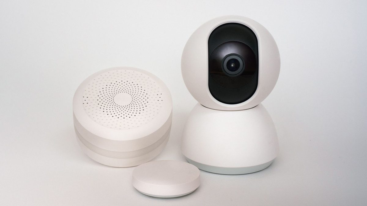 Smart home motion sensor mounted on a wall