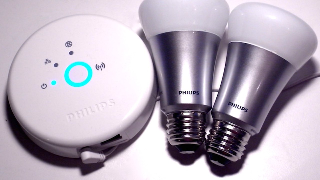 Philips Hue bridge and smart bulbs on a desk