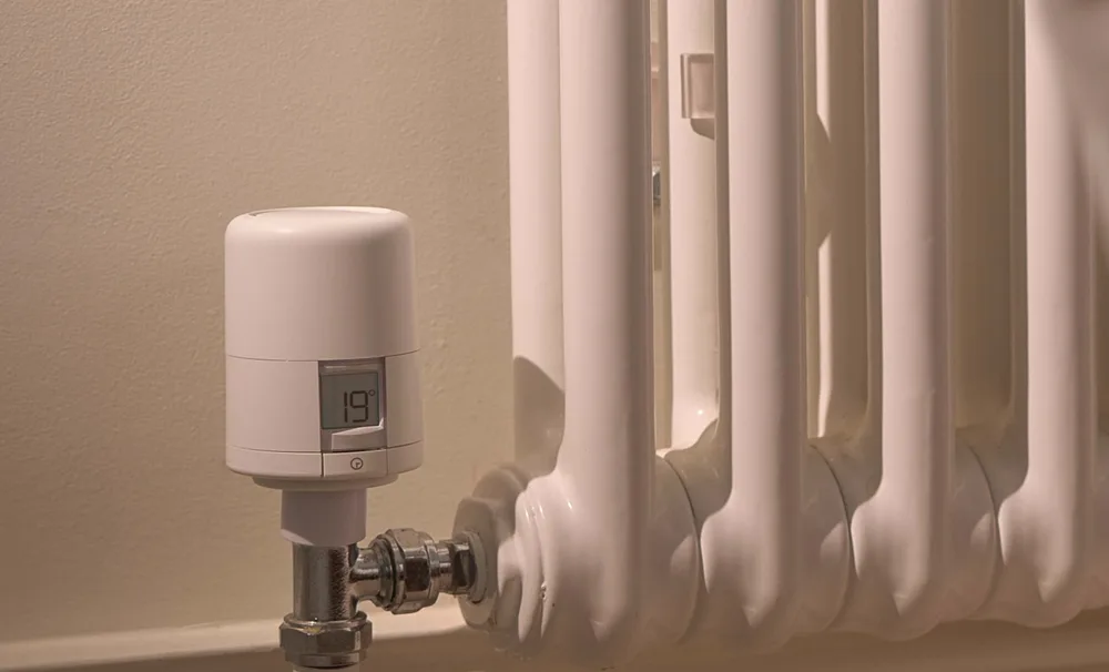Hive Radiator Valve fitted to a home radiator showing the temperature display